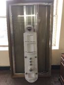 A corner shower enclosure together with power shower column