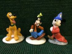 Three Royal Doulton Fantasia figures comprising of Sorcerer's Apprentice,