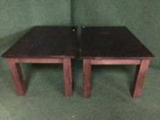 A pair of stained pine coffee tables