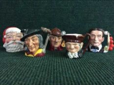 Five Royal Doulton character jugs : Santa Claus D6705, Pied Piper D6402 etc.