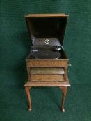 An oak Columbia gramophone on cabriole legs
