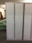 A large metal Bisley shutter door office cabinet