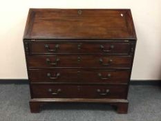 An early nineteenth century mahogany bureau