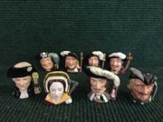 Eight Royal Doulton miniature character jugs : Robin Hood, George Washington, Long John Silver,