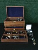 A brass-mounted teak jewellery box, fitted with a lift-out tray above and a drawer below,