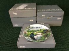 Twelve boxed Wedgwood collector's plates depicting rural scenes