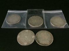 Four Charles II crowns; 1673 (X2), 1677 and 1682. Together with a Queen Anne crown, 1708.