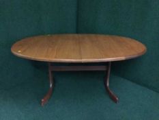 A G-Plan teak extending dining table