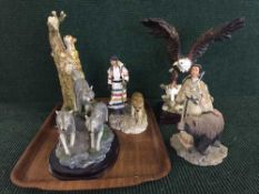 A tray of five resin figures,