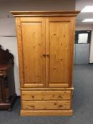 A Pine two door wardrobe