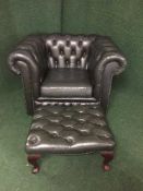 A green button leather Chesterfield armchair and matching footstool