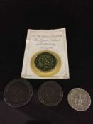 Two Georgian pennies, a Maltese silver coin and a commemorative coin.