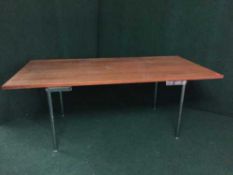 A mid 20th century teak topped office table on chrome legs