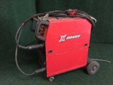 A Nexus NXN325 mig welder