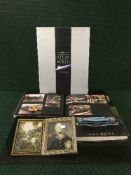 A crate containing an interesting selection of loose cigarette cards,