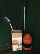 A Vax steam carpet cleaner together with a Vax commercial cleaner