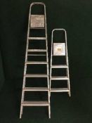 Two sets of folding aluminium steps