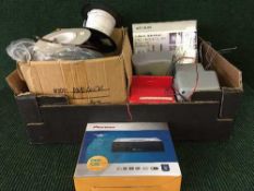 Two boxes of dvd players, surround sound speakers, wireless routers, cabling etc.