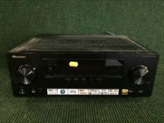 A Pioneer VSX-930 AV receiver with remote