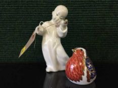 A Lladro figure Angel playing violin together with a Royal Crown Derby Robin paperweight with gold