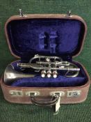 A cased cornet by Lark