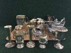 A tray of three piece silver plated tea service, flower holders, crystal ice bucket etc.