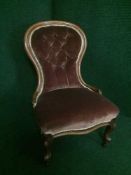 A mahogany framed nursing chair