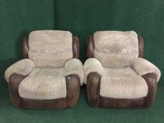 A three piece lounge suite with electric reclining mechanisim in two tone mocha