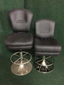 Two contemporary black leather adjustable bar stools