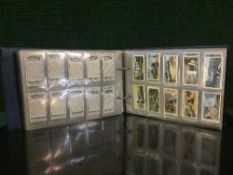 A bound folio of cigarette cards relating to trains : Great Western Railway by Wills,