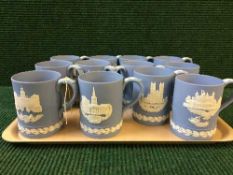 A Tray of twelve Wedgwood Jasperware blue and white Christmas tankards