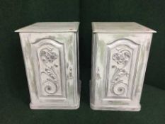 A pair of painted bedside cabinets