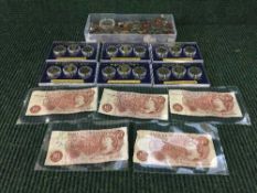 A box containing American Presidential coin proof set and a quantity of British coinage