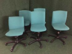 A set of five Comforto swivel office chairs (green)