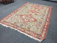 A fringed Turkish rug of zoomorphic design