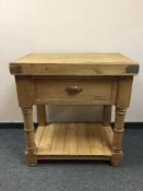 A reclaimed pine butcher's block fitted with a drawer