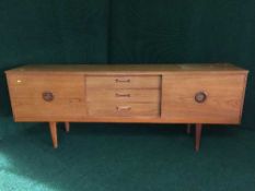 A mid 20th century teak low sideboard