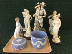 A tray of blue and white jasper ware lidded bowl, planter, Nao figurine,