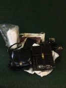 Two boxes of lady's leather hand bags