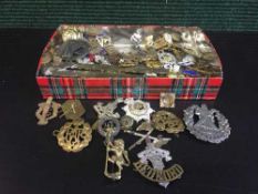 A box of military buttons and badges