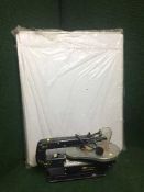 A Powercraft scroll saw and a 6' folding table