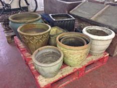 A pallet of garden planters,