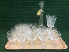 A tray of glass decanter with stopper and assorted crystal glasses