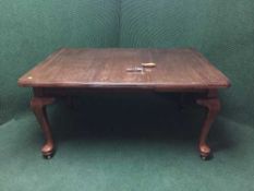 A Victorian wind out table with leaf and winder