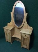 A pine sunk centre dressing table
