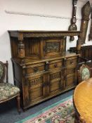 A carved oak buffet sideboard,