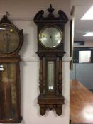 A late Victorian oak aneroid barometer by F.