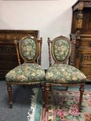 A set of five walnut late Victorian salon chairs