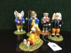 Five Royal Doulton Rupert the Bear figures.