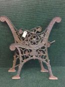 A pair of cast iron bench ends